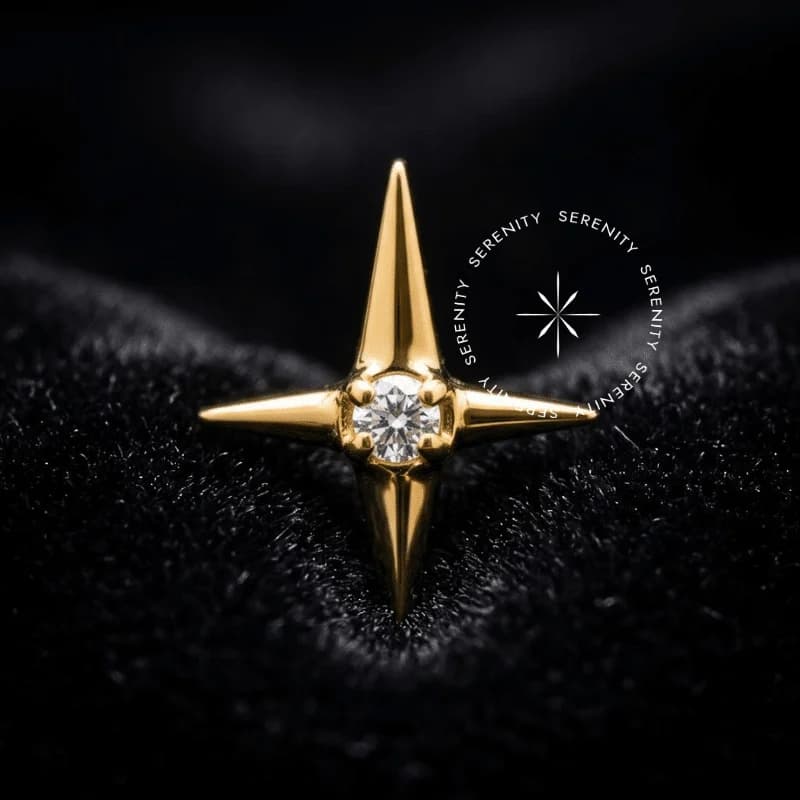 TN1843 - Topo Estrela 4 Pontas - Titânio Revestido de Ouro 18k — foto 1