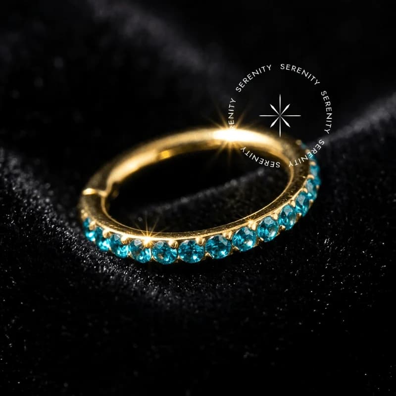 TN310 - Argola Cravejada Aqua Blue - Titânio Revestido de Ouro 18k — foto 1