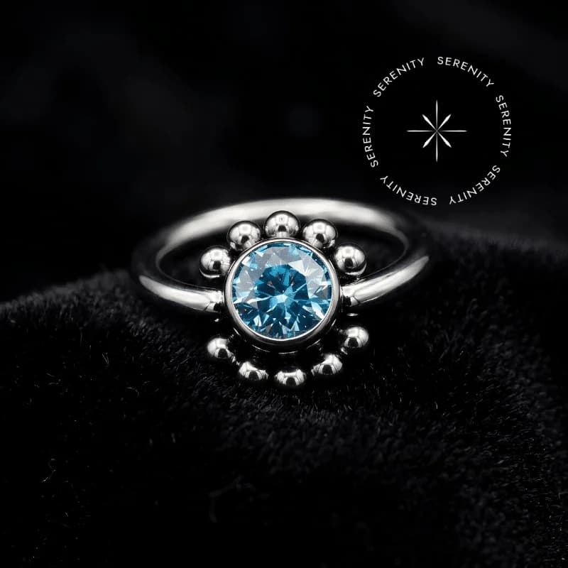 TN73 - Piercing Captive Sol Zircônia Azul - Titânio Grau Implante ASTM F136 — foto 1
