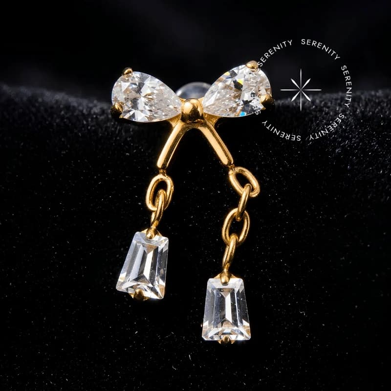 TN2149 - Topo Laço Pingente CZ - Titânio Revestido de Ouro 18k — foto 1