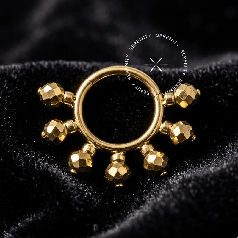 TN548 - Argola Frontal Cinética com 7 Esferas Giratórias - Titânio Revestido de Ouro 18k — foto 1