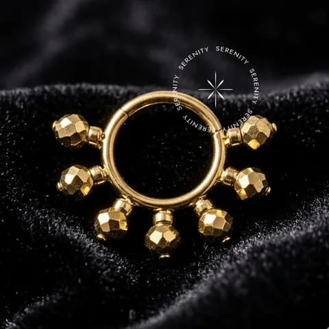 TN548 - Argola Frontal Cinética com 7 Esferas Giratórias - Titânio Revestido de Ouro 18k