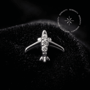 piercing titânio grau implante com design de avião cravejado de zircônias piercing titânio grau implante