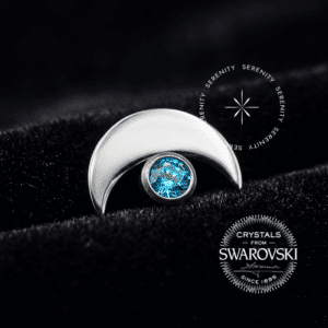 Piercing Lua Titânio TS06 de rosca interna em Titânio ASTM F136 com vibrante cristal azul Aqua Blue.