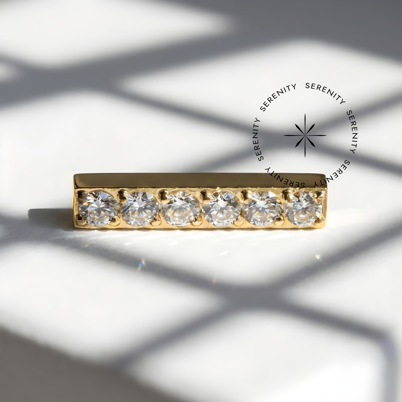 Piercing Topo Barra 6 Zircônias Titânio e Ouro 18k