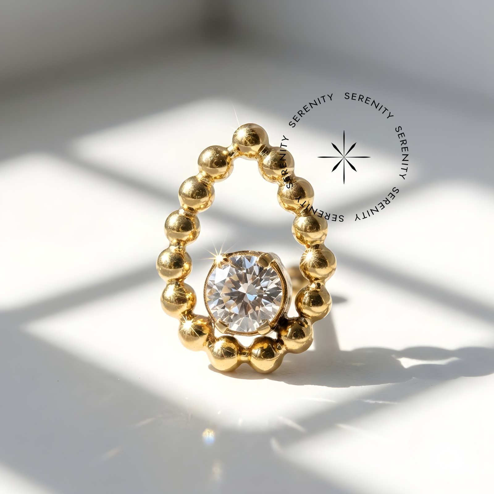 Piercing Topo Gota com Esferas e Zircônia Titânio e Ouro 18k