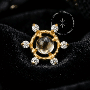 Piercing Sol Água-Marinha TN1748 em titânio revestido de ouro 18k com zircônias premium e gema azul clara.