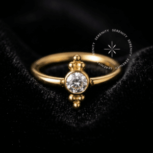 Argola captive titânio revestido de ouro 18k com esfera de fechamento trabalhada com zircônia e micro-esferas para septo e daith.
