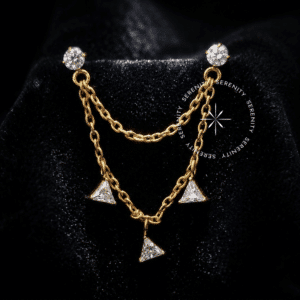Piercing Corrente Triângulos Titânio TN1757 duplo cravejado com zircônias em titânio revestido de ouro 18k.