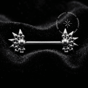Par de Piercing de Mamilo Spikes em Titânio Grau Implante polido, destacado em fundo preto profundo (Noir) para máxima fidelidade de brilho.