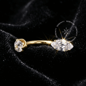 Piercing Umbigo Navete Titânio revestido de ouro 18k com zircônia premium corte marquise, rosca interna protetora.