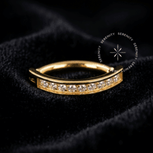 Piercing Umbigo Cravejado Titânio revestido de ouro 18k com zircônias premium em fileira, trava clicker.