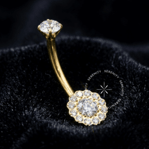 Piercing Umbigo Flor Titânio TN654 revestido em Ouro 18k com detalhe de zircônias premium em formato floral.