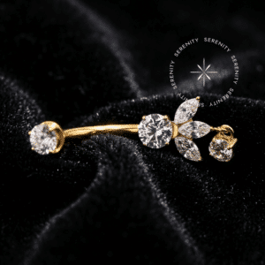 Piercing Umbigo Flor Baguetes em Titânio Revestido de Ouro 18k modelo TN1168 da Serenity.