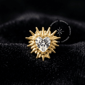 Piercing Coração Cravejado TN895 em titânio grau implante revestido de ouro com zircônia cristal central e raios.