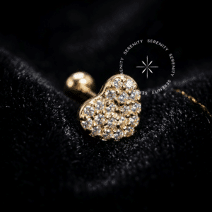 O Piercing Coração Ouro OR98 esculpido em Ouro 18K Maciço atua como Piercing Hipoalergênico e Joalheria de Corpo com extrema Biocompatibilidade em sua Atualização de Setup.