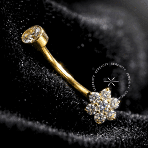 Piercing Umbigo Flor Titânio revestido de ouro 18k com zircônias premium agrupadas, rosca interna segura.