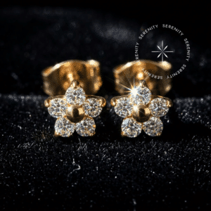 Brinco Flor Titânio Revestido de Ouro 18k com zircônias premium para perfuração de lóbulo seguro e hipoalergênico.