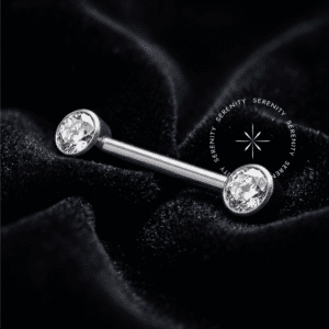 Par de Piercing de Mamilo TN819 com zircónia Flat Cristal em Titânio Grau Implante polido sobre fundo preto Noir.