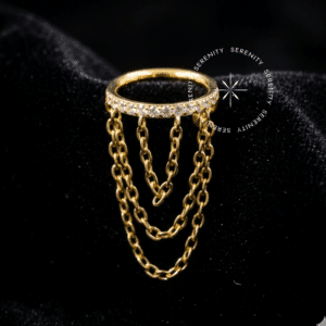 Argola correntes titânio revestido de ouro 18k com cravação em zircônias para lóbulo e helix.