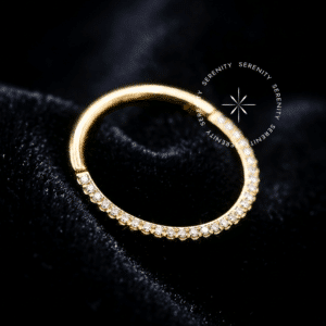 Argola cravejada inca titânio revestido de ouro 18k com zircônias frontais para septo e daith.