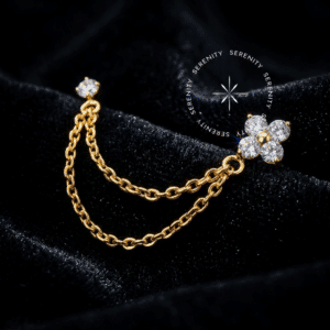 Piercing Trevo Corrente TN1703 cravejado com zircônias em titânio revestido de ouro 18k.