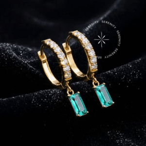Brinco Argola Clicker Pingente Baguete Titânio revestido de ouro 18k com zircônias cristal e paraíba, fecho clicker.