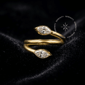Argola navete dupla titânio revestido de ouro 18k com duas zircônias marquise para perfurações de helix e lóbulo.