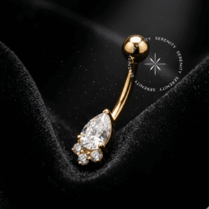 Piercing Umbigo Gota Trinity Titânio revestido de ouro 18k com zircônias premium e rosca interna segura.